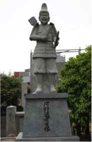 ④井手神社に建つ像